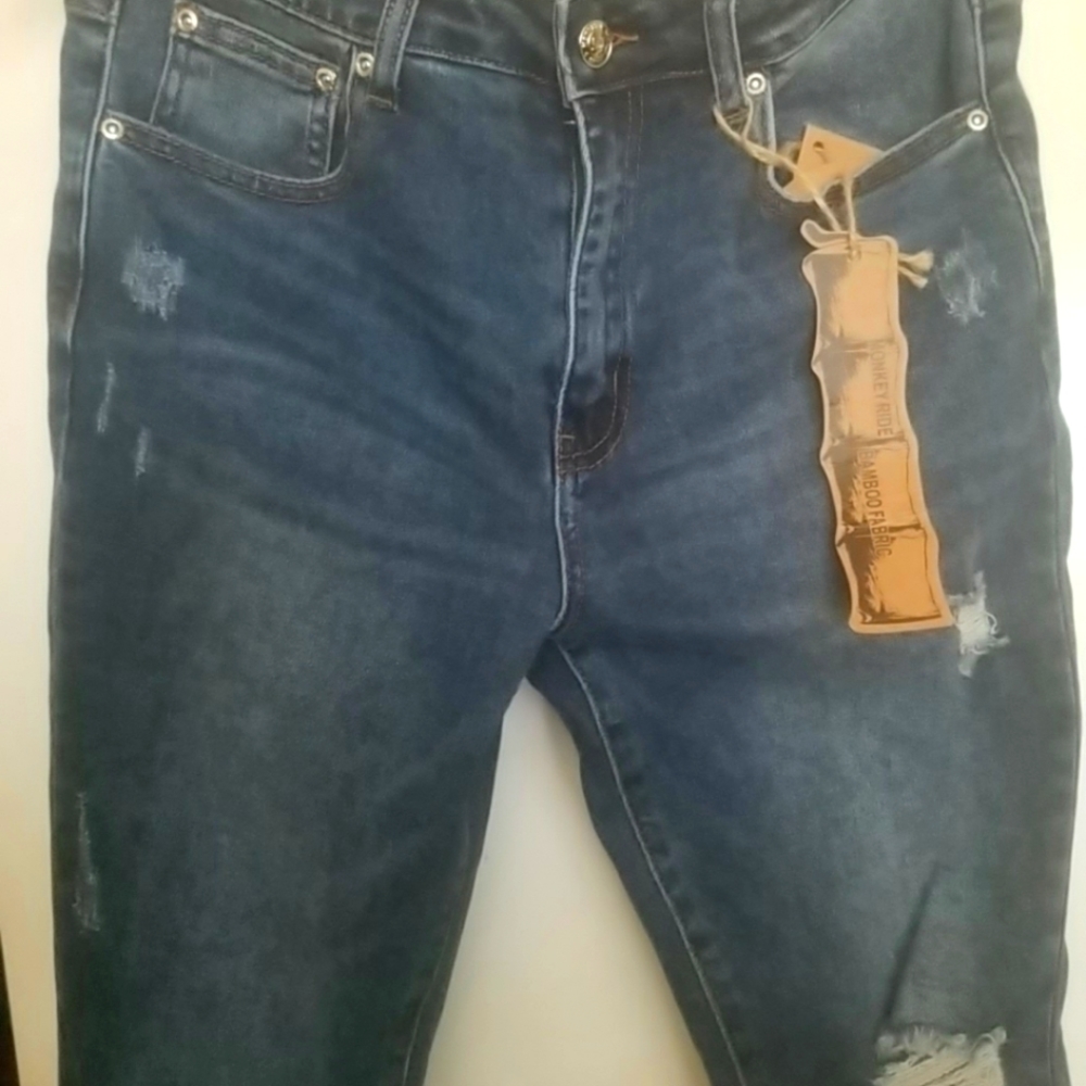 Skinny, high rise mid blue jeans
